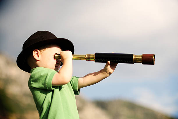 A young boy has his goal in sight representing clarity as one of the benefits of business planning