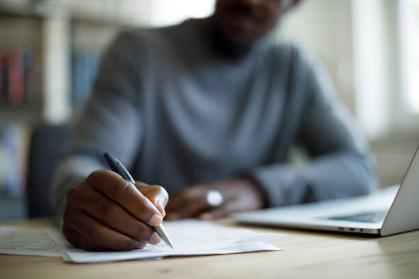 Man writing a business plan